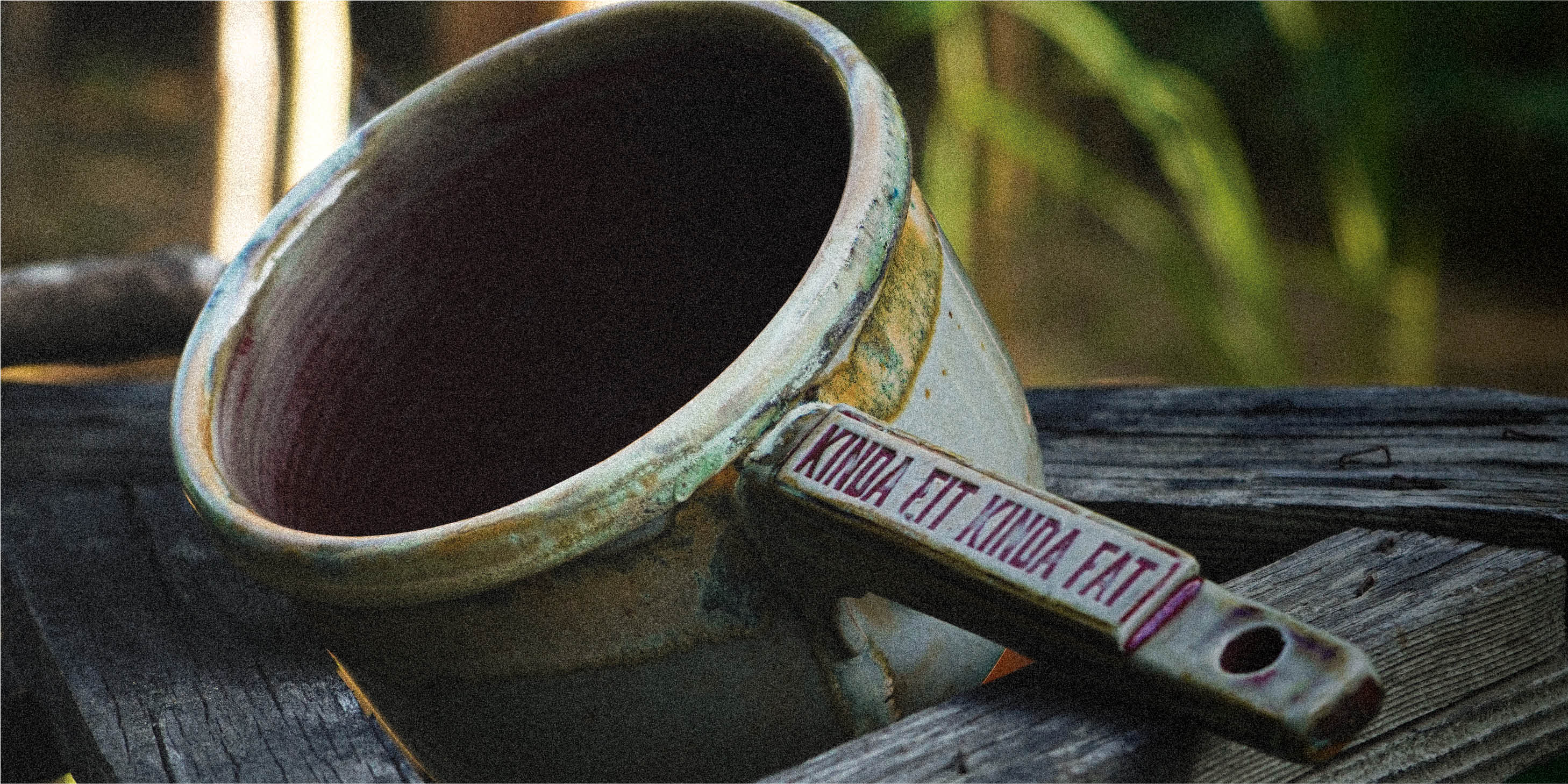 clay ceramic tabo bowl on wood branches in work bench